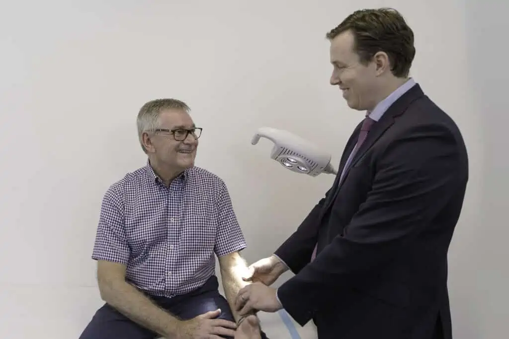 Dr Ben Lancashire talking to a patient