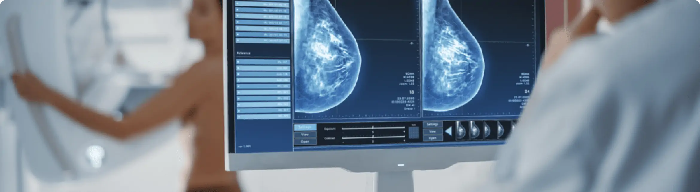 Dr examining breast scans